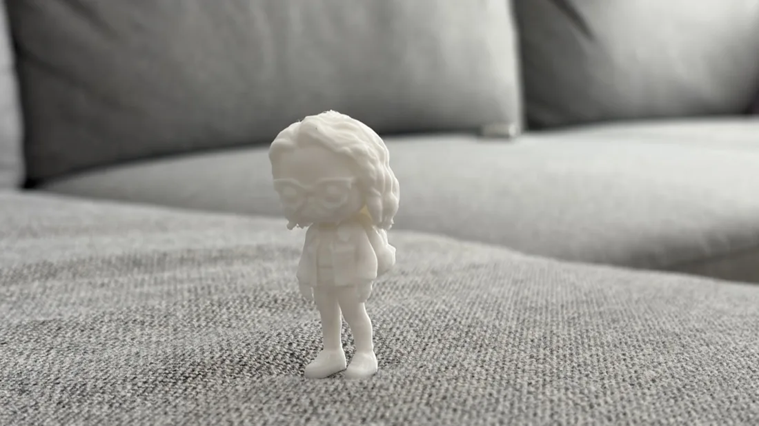 Three quarter back view of the printed figure showing the hair detail